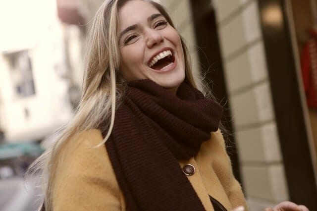 Laughing girl in the street