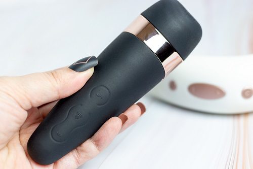 Satisfyer Pro 3+ in a woman's hand