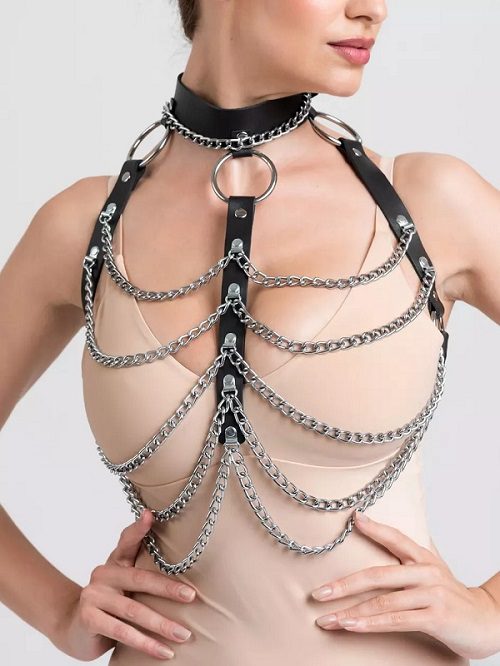 Woman in the DOMINIX Deluxe Leather and Chain Harness Bra