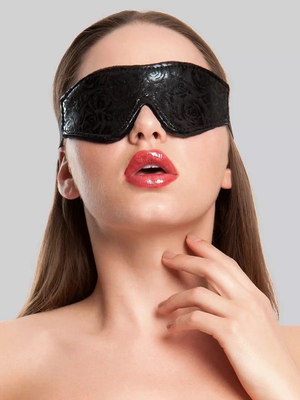 Woman wearing the Bondage Boutique Black Rose Faux Fur Lined Blindfold